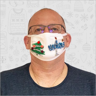 Matt Stern wearing his holiday face mask
